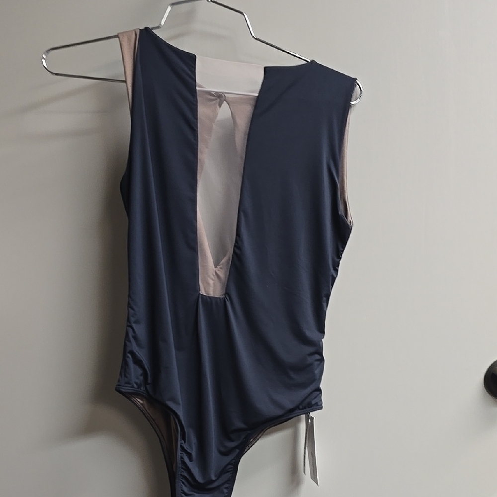Black and Cream One-Piece Swimsuit with Plunging V-Neck